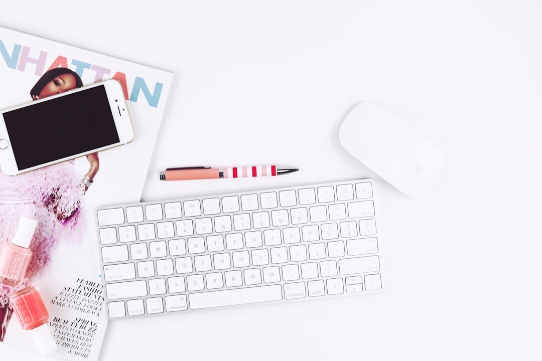 Flat lay of a magazine layout with photos and notes on a desk